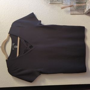 Black textured knit top with twist design neckline size medium New w/o tags